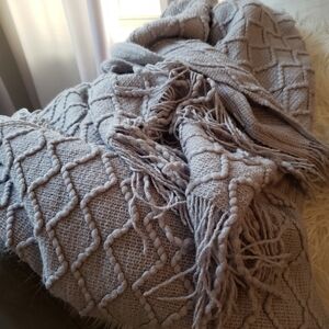 Grey knit tassel throw blanket